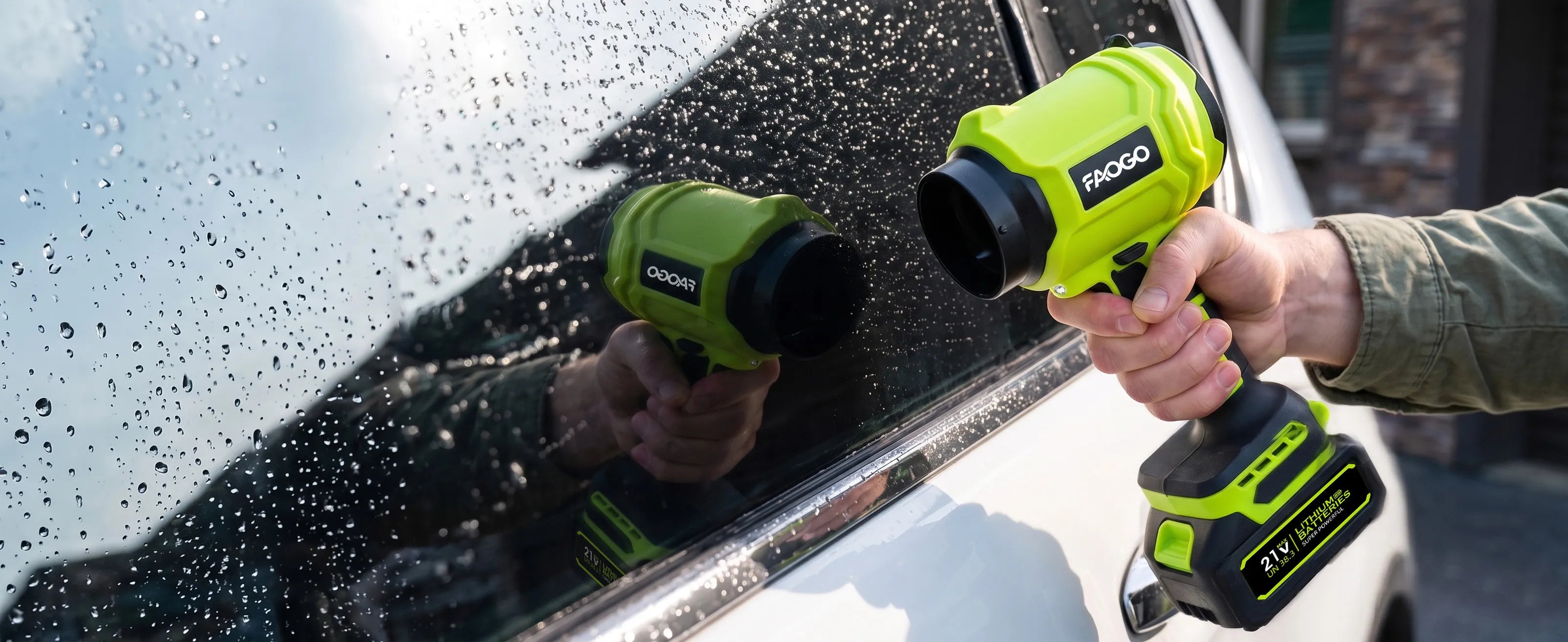 Drying a wet car window with FAOGO portable turbo fan