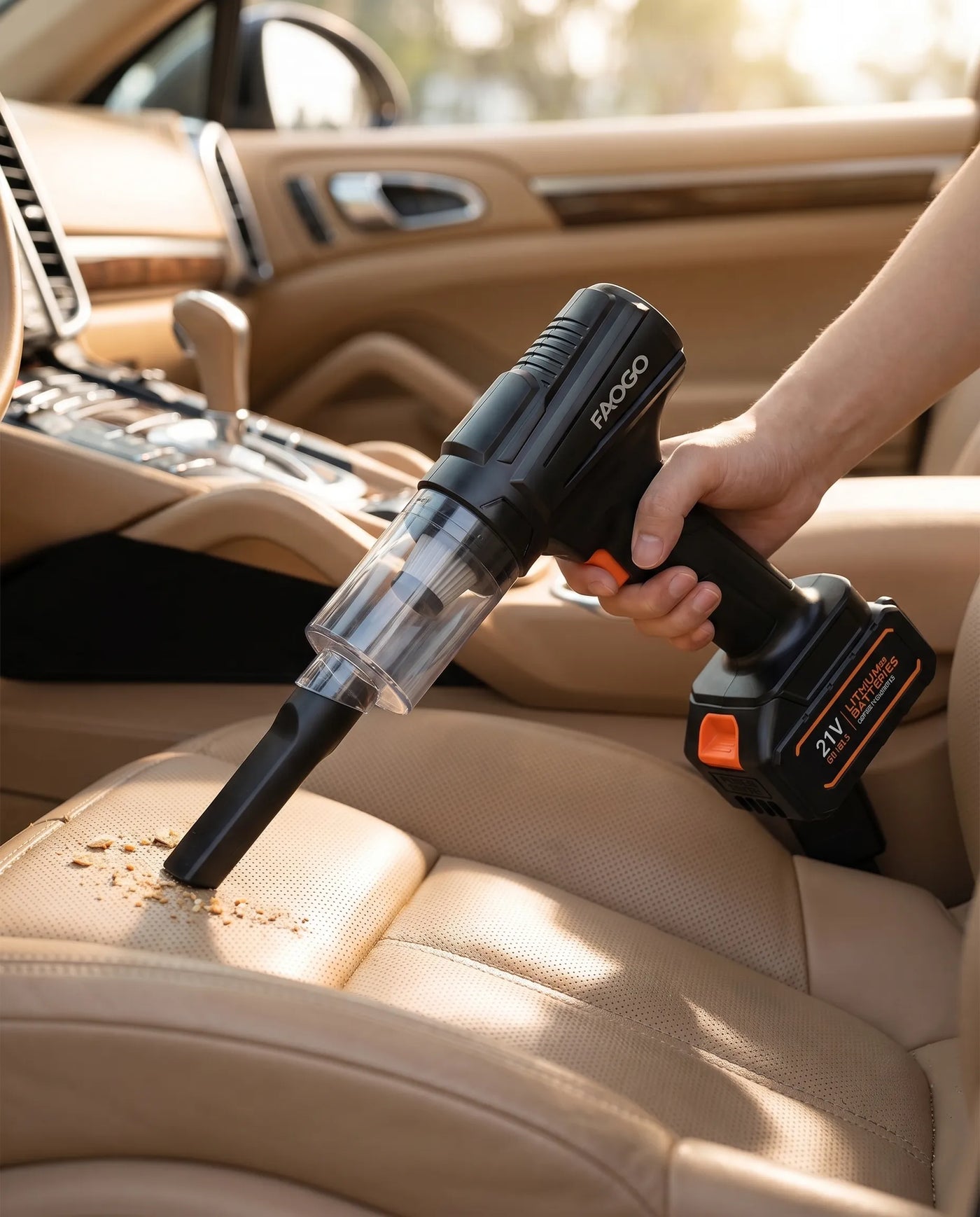 FAOGO 21V cordless auto detailing vacuum cleaning crumbs from a leather car seat. Portable vehicle interior gap cleaner.