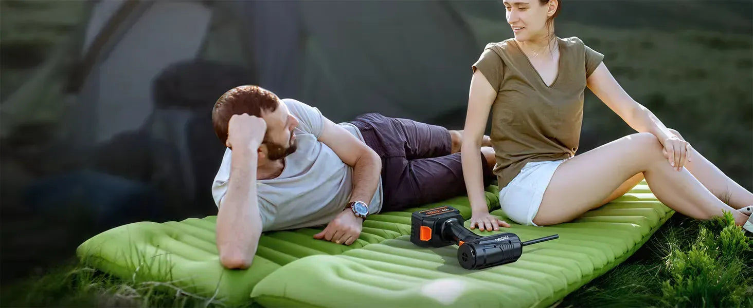 FAOGO cordless tool inflating a camping air mattress. Portable 21V battery powered electric pump for outdoor adventure.